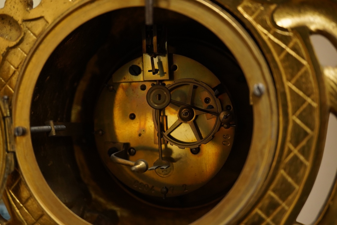 An early 20th century French Louis XV-style ormolu clock garniture - clock 50cm high